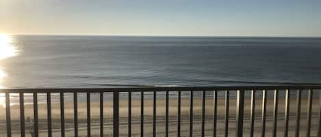 Watch the sunrise on your private oceanfront balcony!