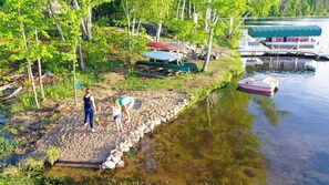 The beach area, fire pit, grill #2 and the many watercraft available