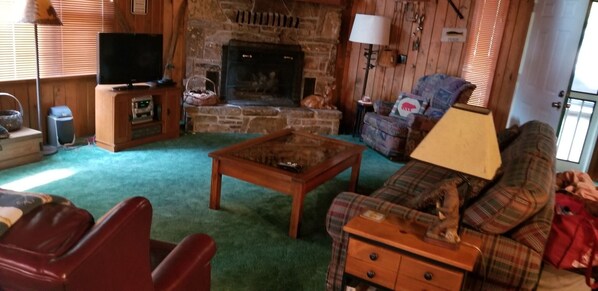 Inviting living room with gas fireplace.  Plenty of room for family