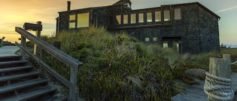 Sunset view of the front of the house. The front of the house faces the ocean.