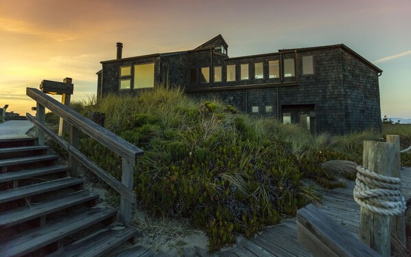 Sunset view of the front of the house. The front of the house faces the ocean.