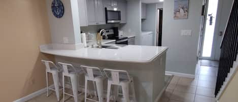 View of kitchen from dining area