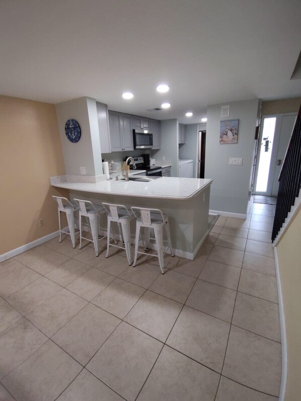 View of kitchen from dining area