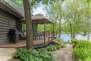 Large Deck with expansive riverviews, screened gazebo and seating for 8 people. 