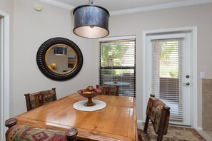 Dining area with patio beyond.