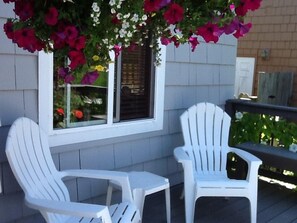 A cozy spot to read a book on the front deck.