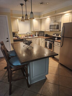 Updated kitchen with all cooking utensils 