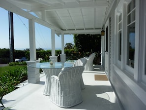 Relax on the covered porch.We are located on the beach side of Pacific Coast Hwy