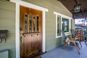 Cozy sitting porch on Beautiful tree lined street