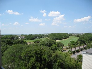 View from balcony of golf course
