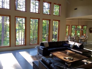 Great Room overlooks trees, pathways and the lake!