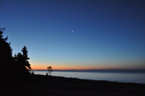 Summer sunset and moonrise. 