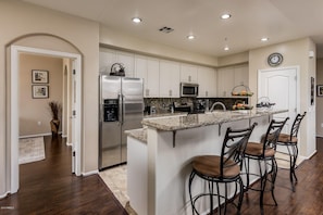 Gorgeous kitchen. Stainless steel appliances and granite counters

