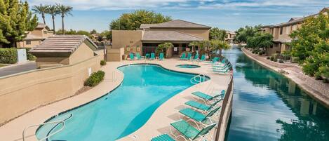 Beautiful pool and hot tub area on canal.