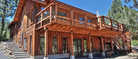 Rear of house with spectacular sweeping river & mountain view from both levels