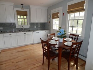 Spacious kitchen with lovely breakfast table with seating for 4. 
