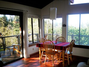 Dining table with mountain views.  Seats up to 6 with available leaf.