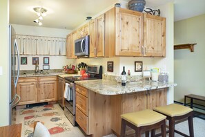 Spices, crock pot, counter space....everything a good cook enjoys.