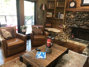 Leather seating for 8 makes family movie-night enjoyable.  The chairs swivel.