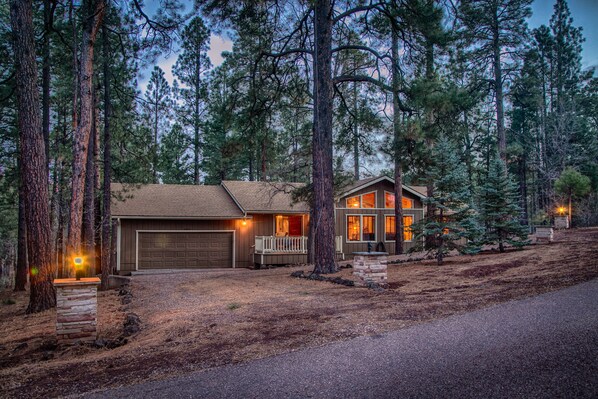 Front of Home has a standard and circular driveway.