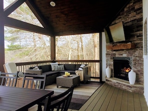 Screened in porch with lake view - just off kitchen / dining area