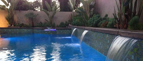 Tropical salt water Pebble tech , glass tile pool/spa offer heated. 