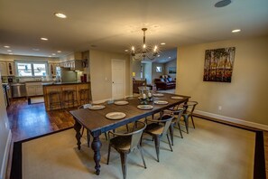 Dining room, table extends to 12 feet, room seats 18 with bench and barstools