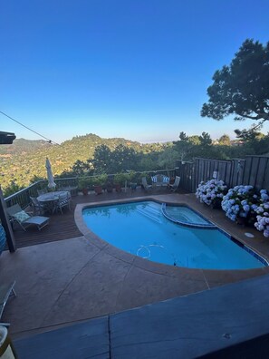 view of the pool deck from the unit