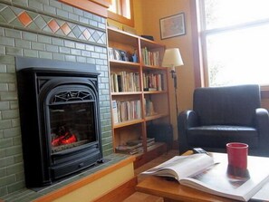 Cozy up by the fireplace with a good book