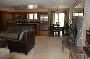 Kitchen table with seating for 8 and Natrual Fireplace