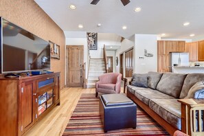 Living Room with Queen hide-a-bed couch HD Smart TV