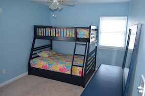 Twin/Full Bunk Beds. Ceiling fan. Dresser and closet for storage.