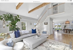 Open plan living room , looks out over pool