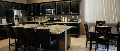 Fully renovated and stocked kitchen with stainless steel LG & Samsung appliance