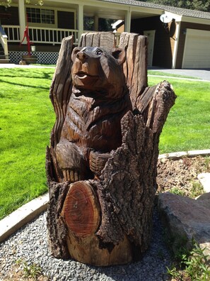 Our cute bear welcomes you as you come up our driveway.