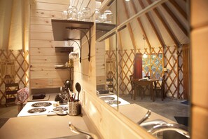 A unique look at dining room from the kitchen mirrors