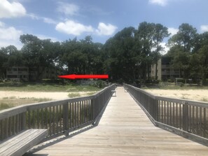 Red arrow points to unit and proximity to the  beach