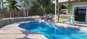 Private Pool with Bar and Lounging Area