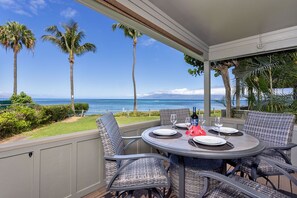 Deck; access from Living Room and Master Bedroom; High top table and chairs