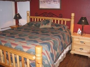 Enjoy the lodgepole pine King-sized bed in the master bedroom