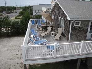 Spacious deck for dining and/or sunbathing.