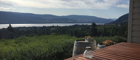 Private outdoor deck  dining with sweeping lake views- your own designated BBQ.