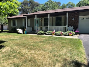 Extra-large front yard with private heated pool in backyard