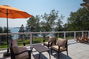 Enjoy the patio overlooking the ocean with a nice bottle of wine and a good book