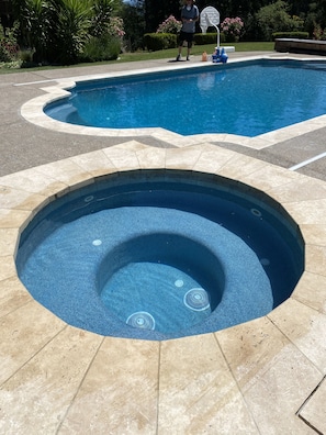 This shows the new tile and stone we did in 2020 on the pool and hot tub