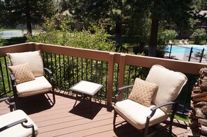 Upstairs deck off of great room with Patio chairs, Gas Weber BBQ, and 180 view