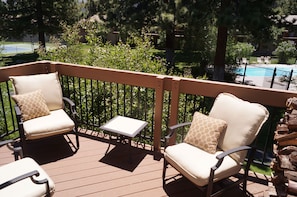 Upstairs deck off of great room with Patio chairs, Gas Weber BBQ, and 180 view