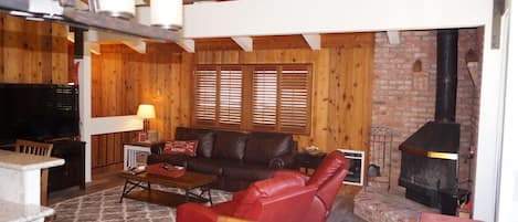 Upstairs  Great Room with wood burning fire place 