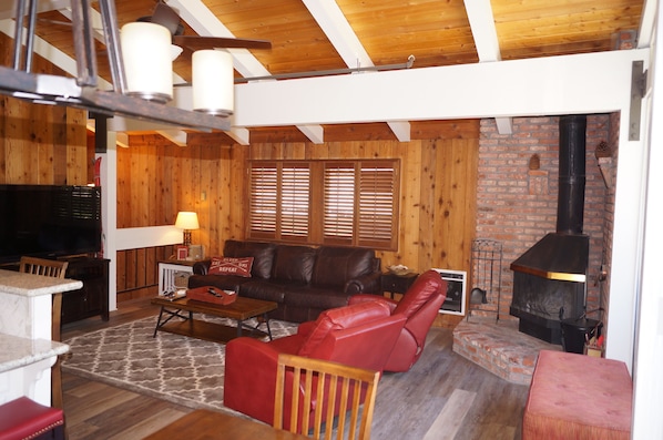 Upstairs  Great Room with wood burning fire place 
