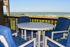 Private ocean front deck facing beach walkway